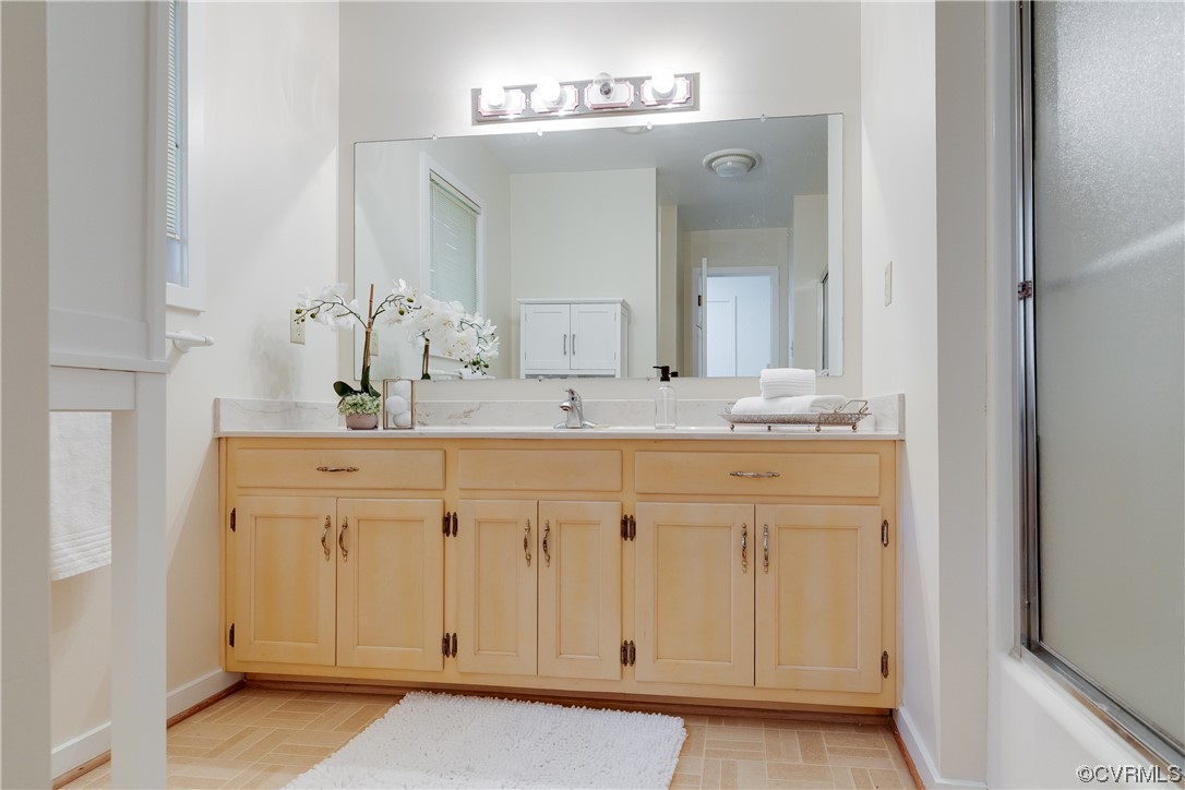 4000 Cheyenne Road Richmond, VA 23235 - Photo 35 of 50 a bathroom with a sink and a mirror