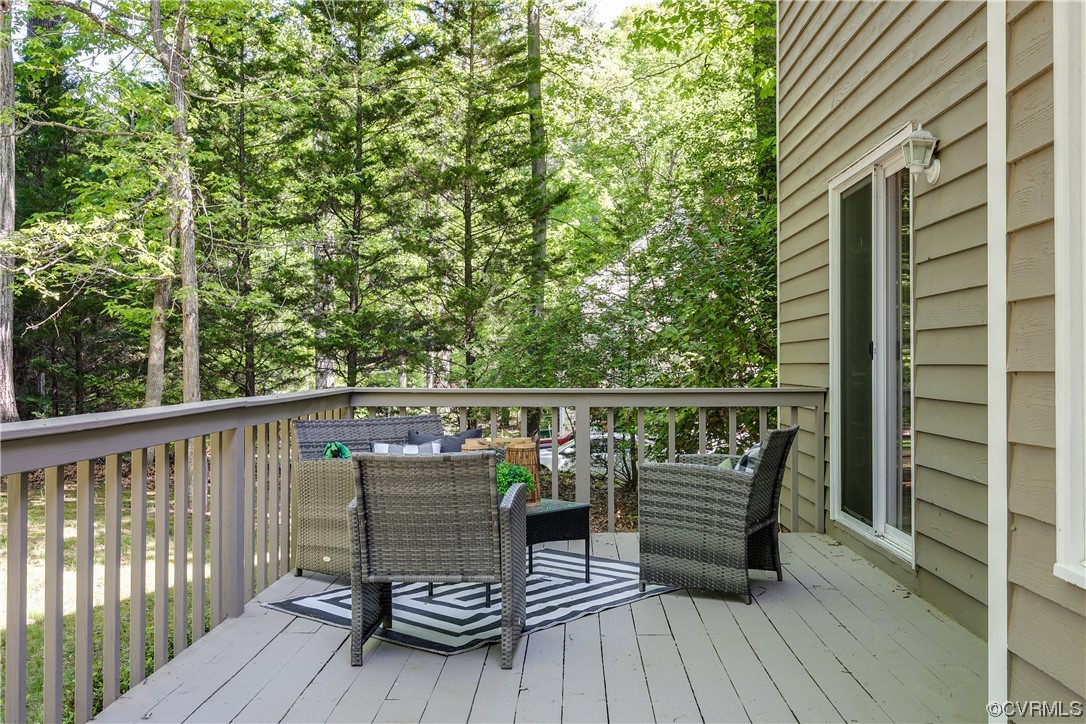 4000 Cheyenne Road Richmond, VA 23235 - Photo 42 of 50 a view of a deck with wooden floor and fence
