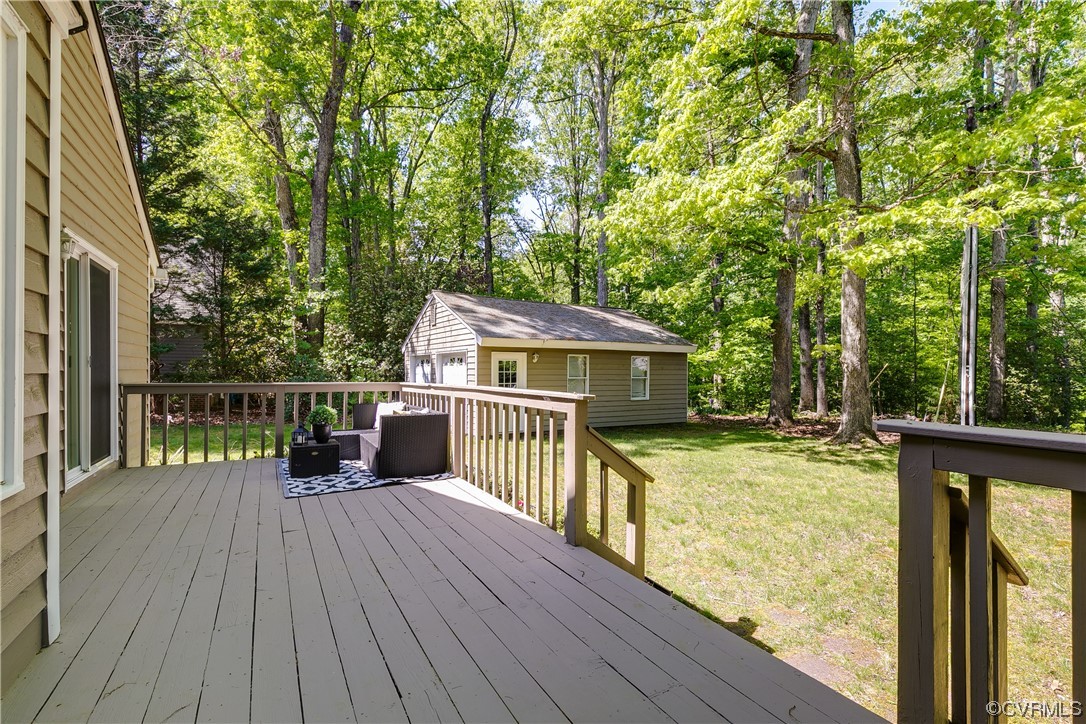 4000 Cheyenne Road Richmond, VA 23235 - Photo 43 of 50 a view of a deck with wooden floor and fence next to a yard
