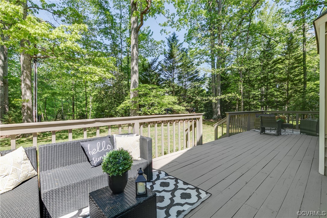 4000 Cheyenne Road Richmond, VA 23235 - Photo 44 of 50 a balcony with wooden floor table and chairs
