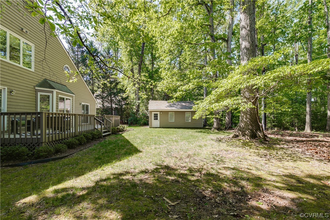 4000 Cheyenne Road Richmond, VA 23235 - Photo 47 of 50 a view of a house with backyard and a garden