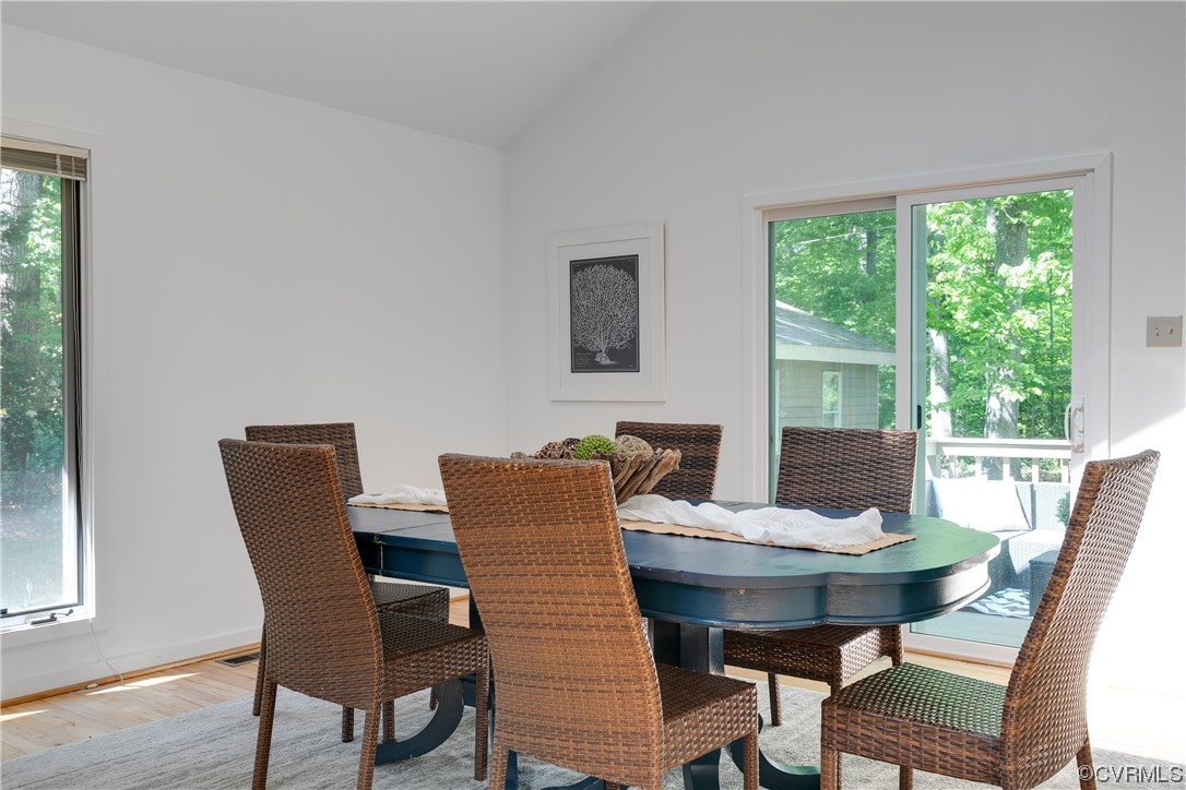 4000 Cheyenne Road Richmond, VA 23235 - Photo 7 of 50 a view of a dining room with furniture window and wooden floor
