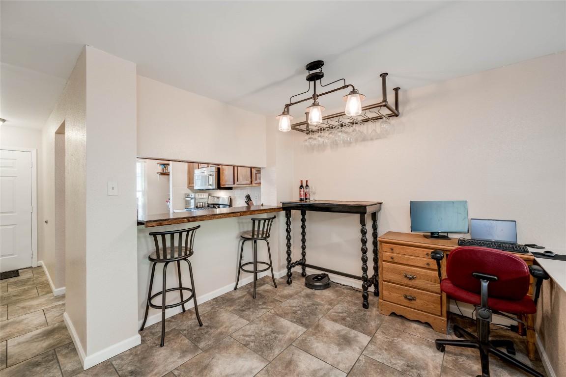 11821 Bittern Hollow, Unit 34 Austin, TX 78758 - Photo 14 of 24 Office space featuring baseboards