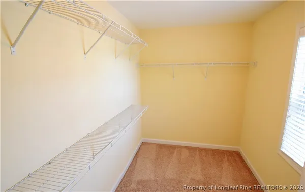 a view of a room with racks on the wall