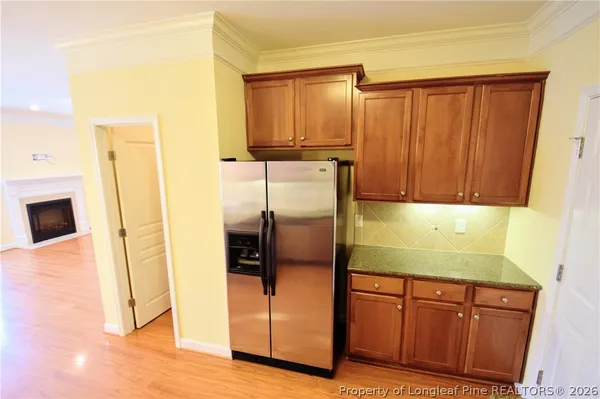 a bathroom with a sink a mirror and shower
