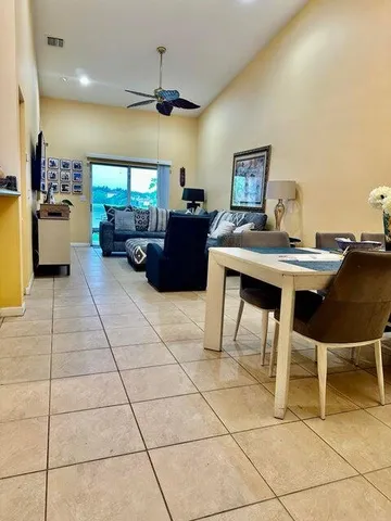 a kitchen with stainless steel appliances a stove a microwave and a refrigerator