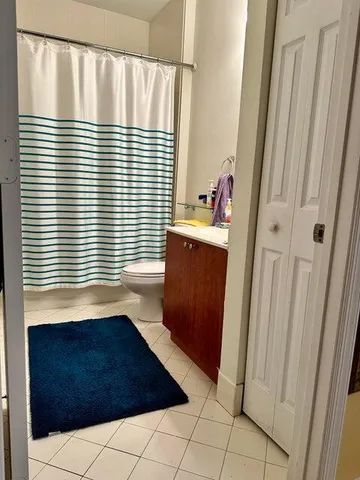 front view of a house with a garden