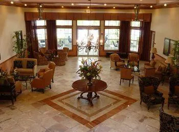 an aerial view of a house with a swimming pool