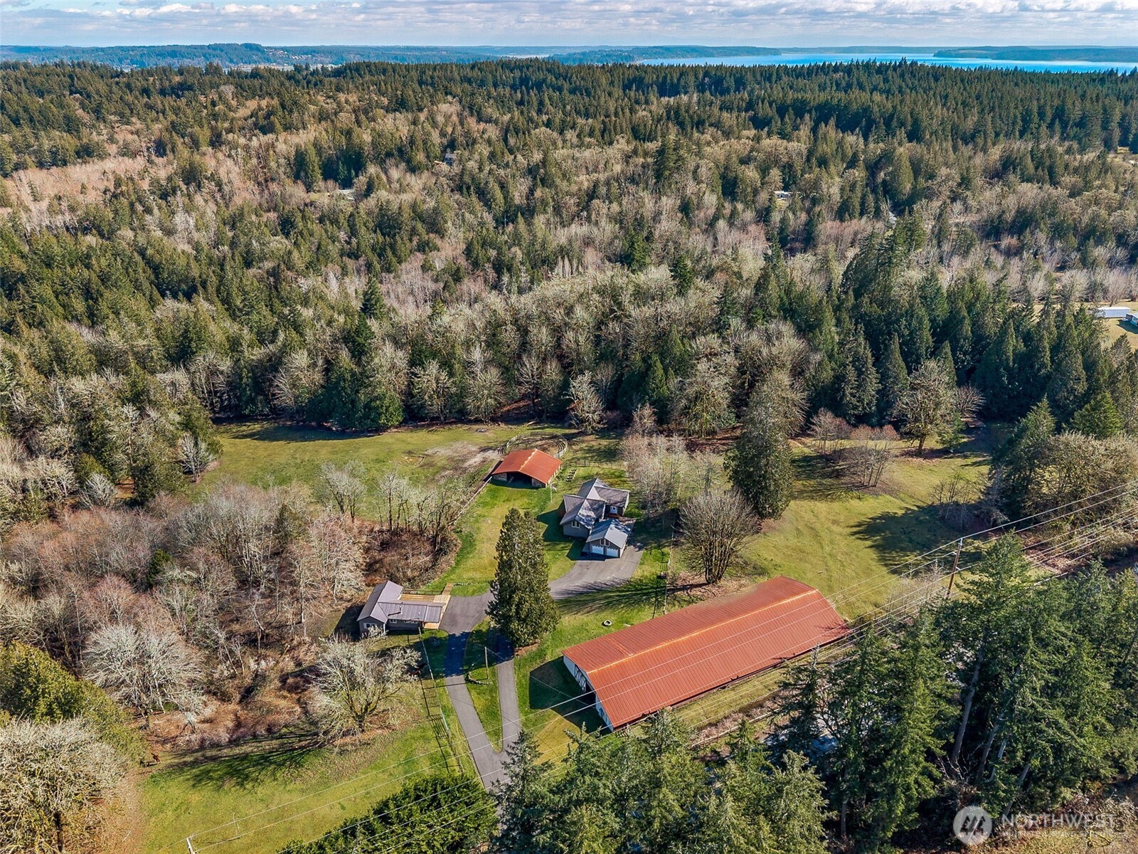 6103 Lackey Road Northwest Vaughn, WA 98394 - Photo 33 of 37 an aerial view of residential house with outdoor space