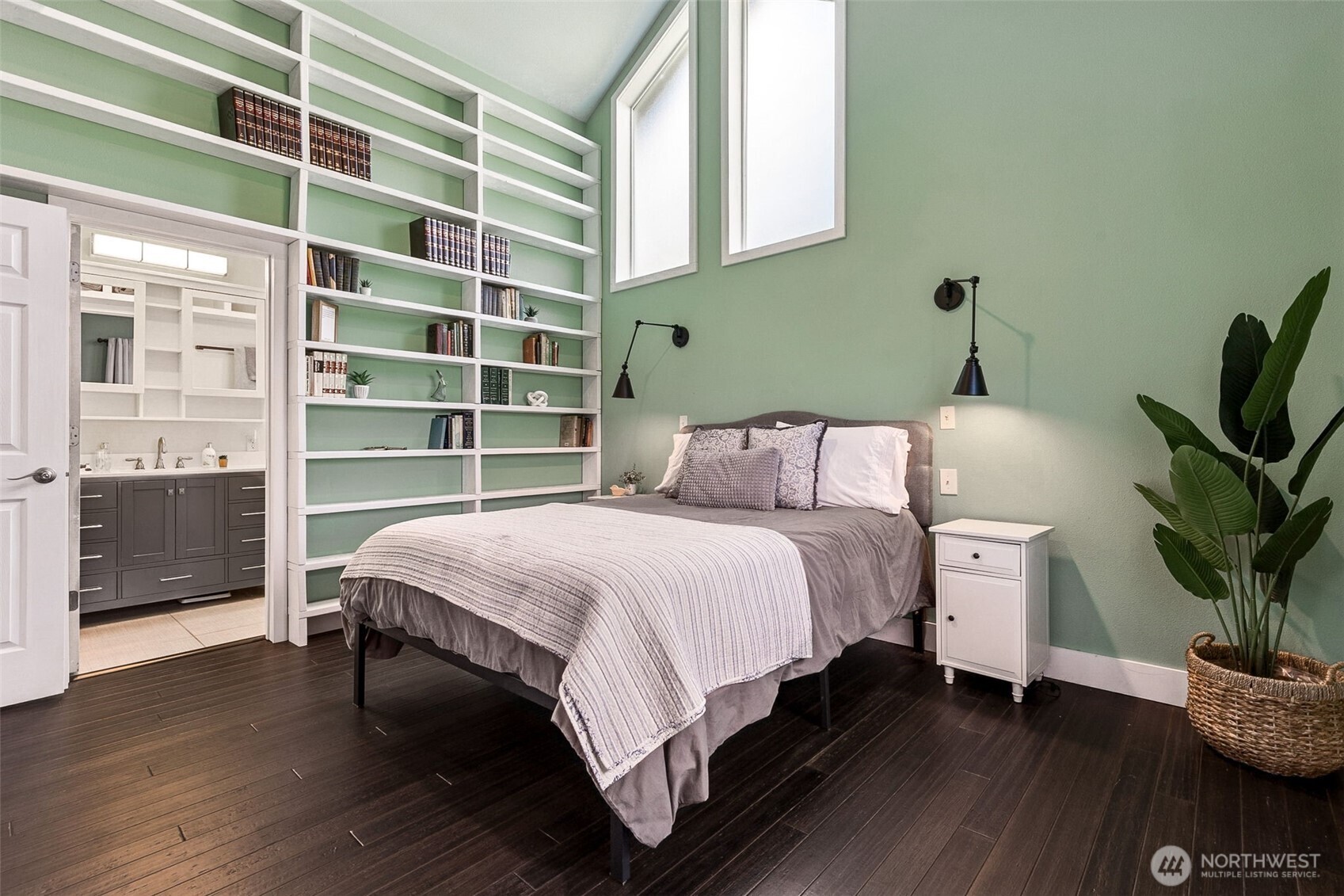 6103 Lackey Road Northwest Vaughn, WA 98394 - Photo 7 of 37 a bedroom with a bed and a flat tv screen on the dresser