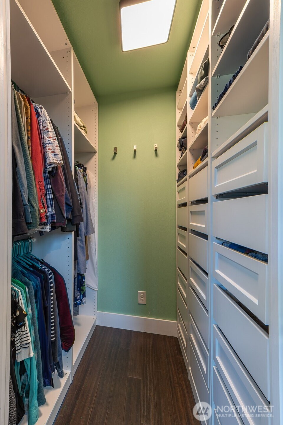 6103 Lackey Road Northwest Vaughn, WA 98394 - Photo 9 of 37 a view of walk in closet with clothes and shoes