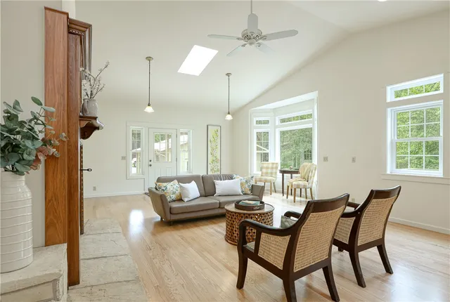 a kitchen with cabinets appliances and a window