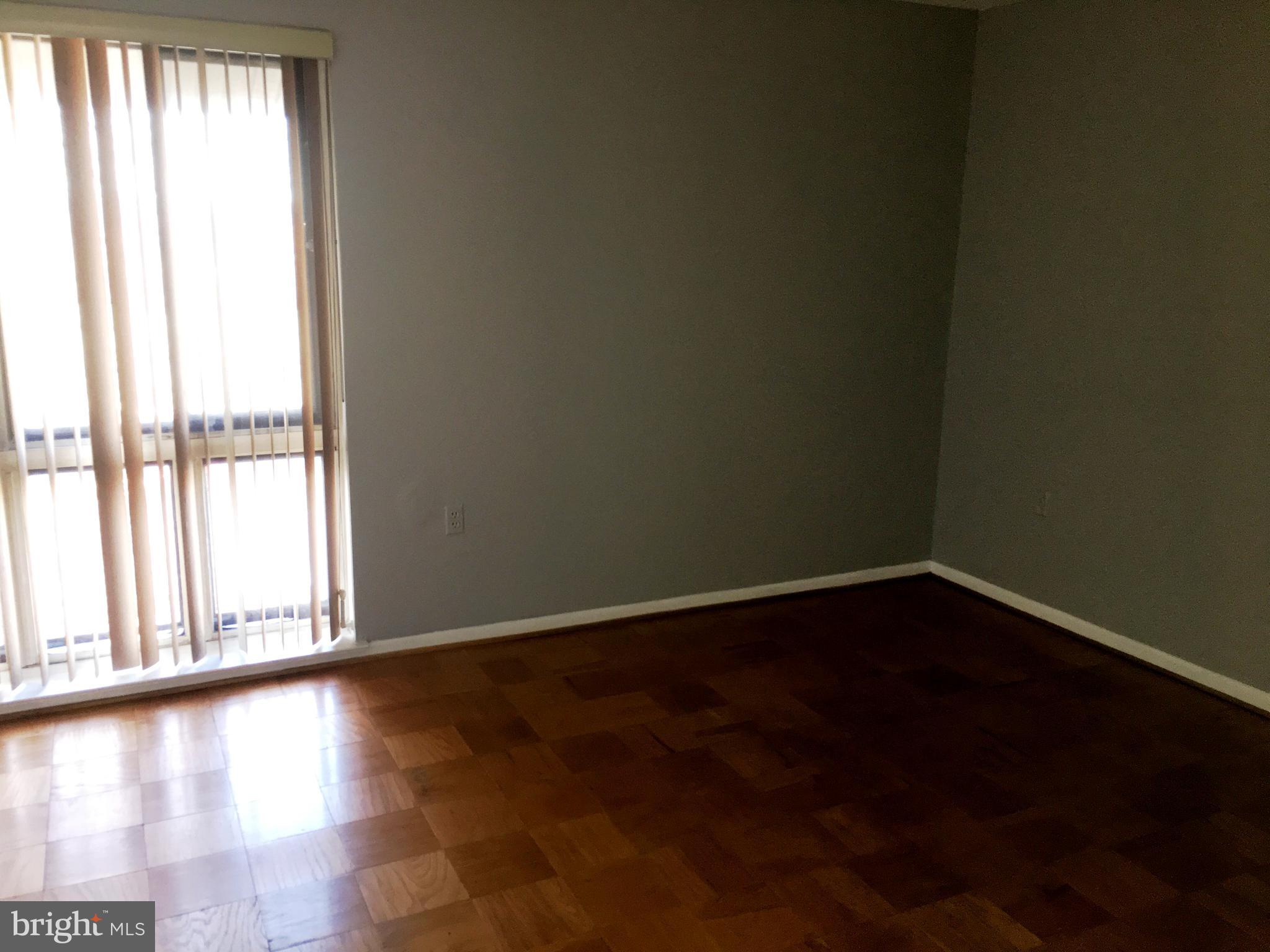 121 Cross Keys Road, Unit R121F Baltimore, MD 21210 - Photo 6 of 13 Bedroom w/extended height windows