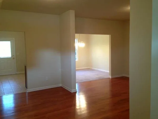 an empty room with an entryway