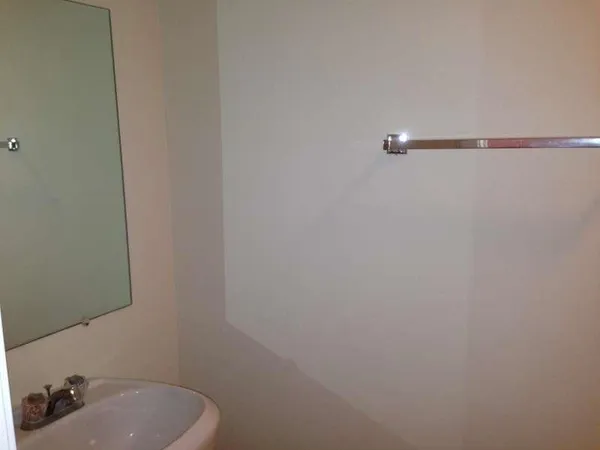 a bathroom with a sink and a toilet
