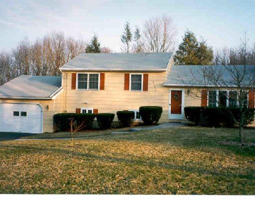 9 Barry Road Shelton, CT 06484 - Photo 1 of 1 a front view of a house with a yard