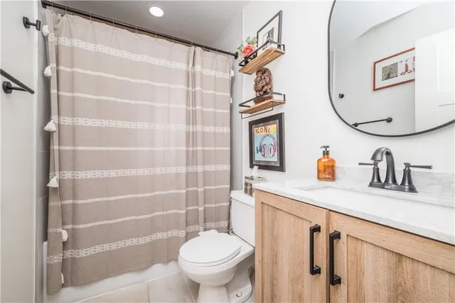a living room with lots of furniture and rug