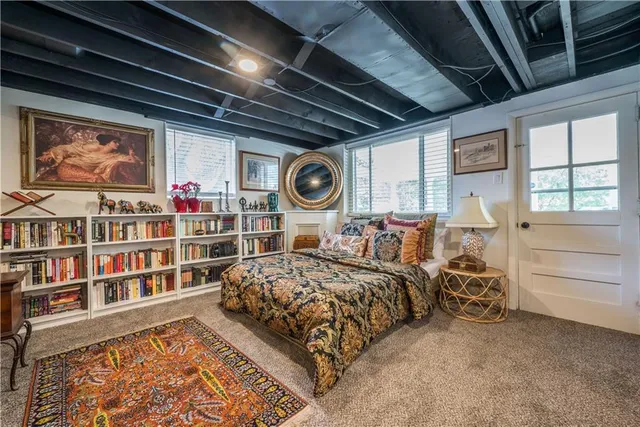 a bathroom with a sink mirror vanity and toilet