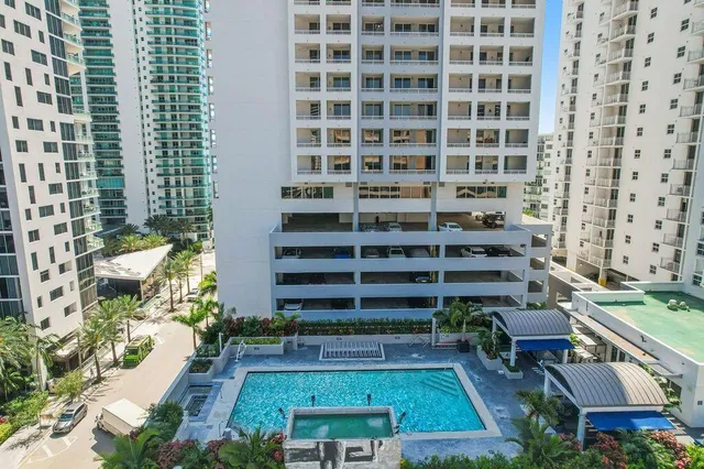 a view of a back yard from a balcony