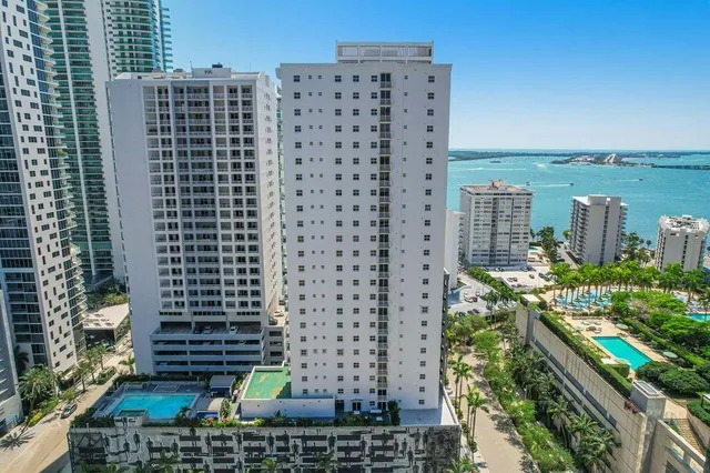 a view of a city with tall buildings