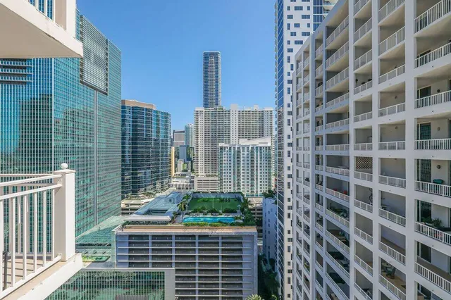 a view of a building with glass windows