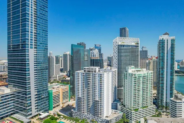 a view of city with tall buildings