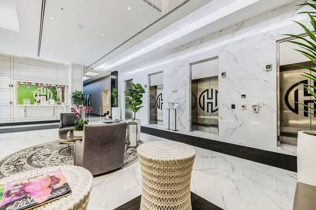 a living room with furniture and window