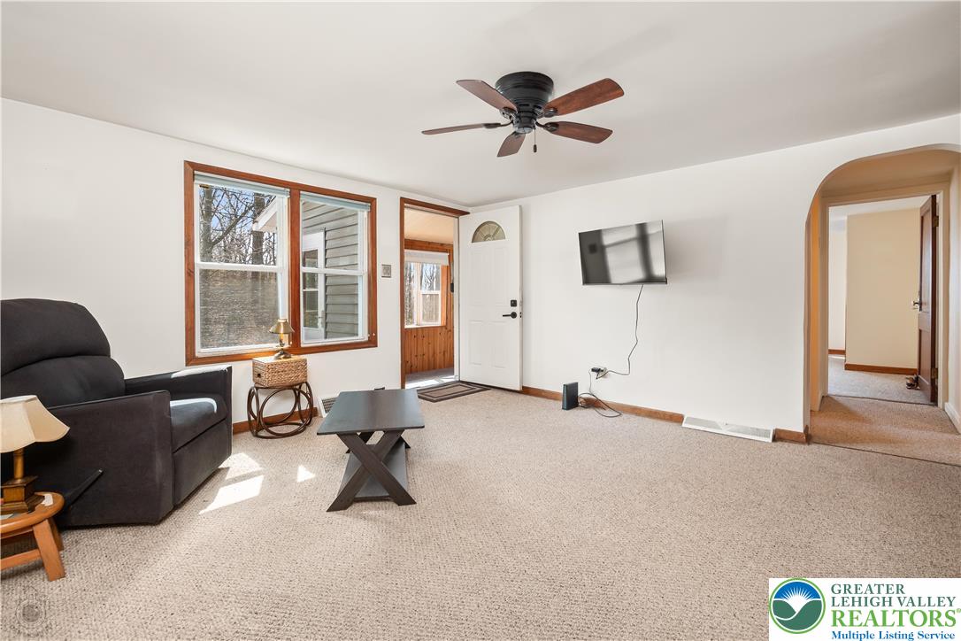 7309 Bell Gate Road Coopersburg, PA 18036 - Photo 20 of 58 a view of a livingroom with workspace and a window