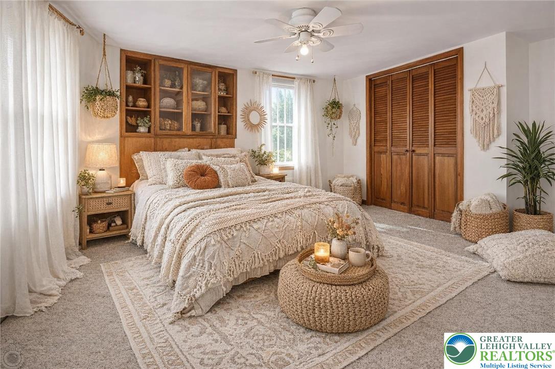 7309 Bell Gate Road Coopersburg, PA 18036 - Photo 29 of 58 a bedroom with a bed and window