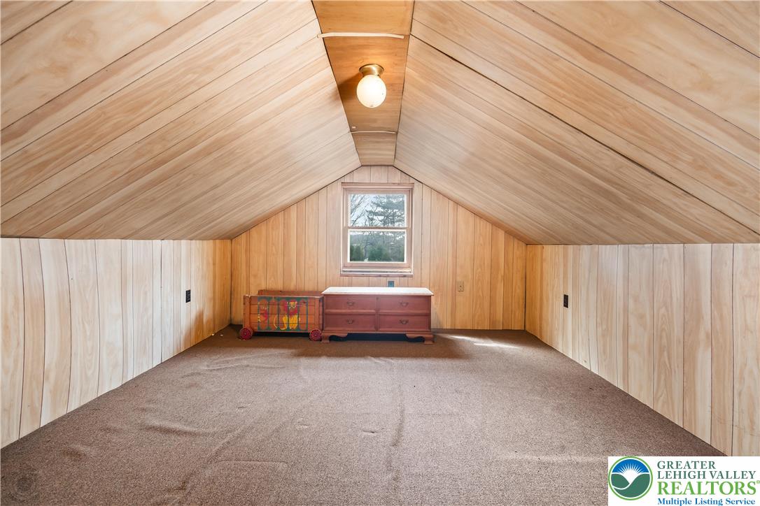 7309 Bell Gate Road Coopersburg, PA 18036 - Photo 39 of 58 a spacious bedroom with a bed and a window