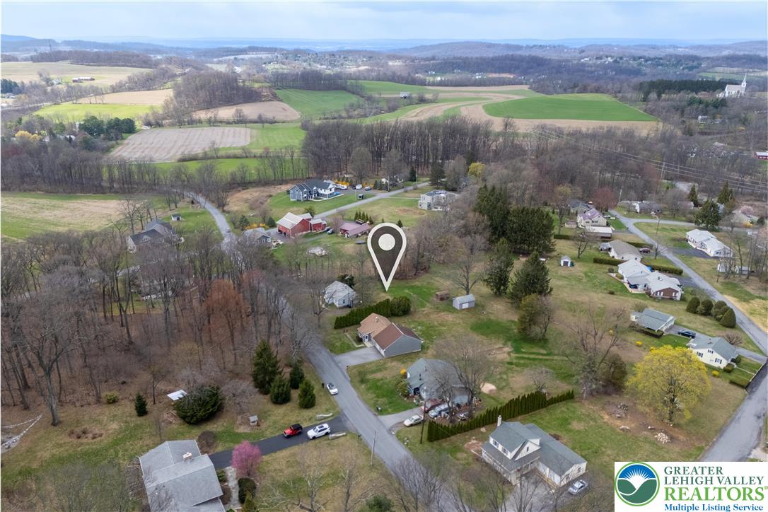 7309 Bell Gate Road Coopersburg, PA 18036 - Photo 51 of 58 an aerial view of a garden with an outdoor space