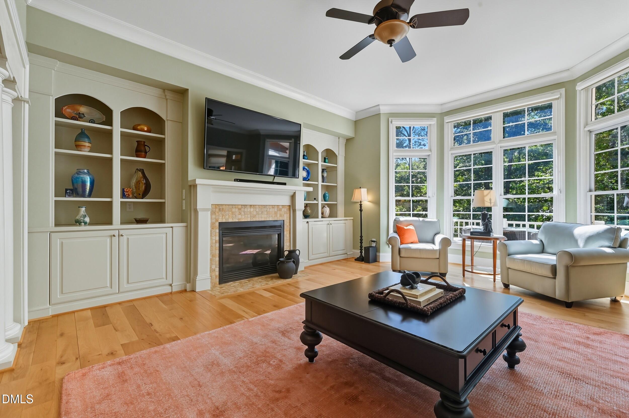 417 The Preserve Trail Chapel Hill, NC 27517 - Photo 11 of 83 a living room with furniture fireplace and flat screen tv