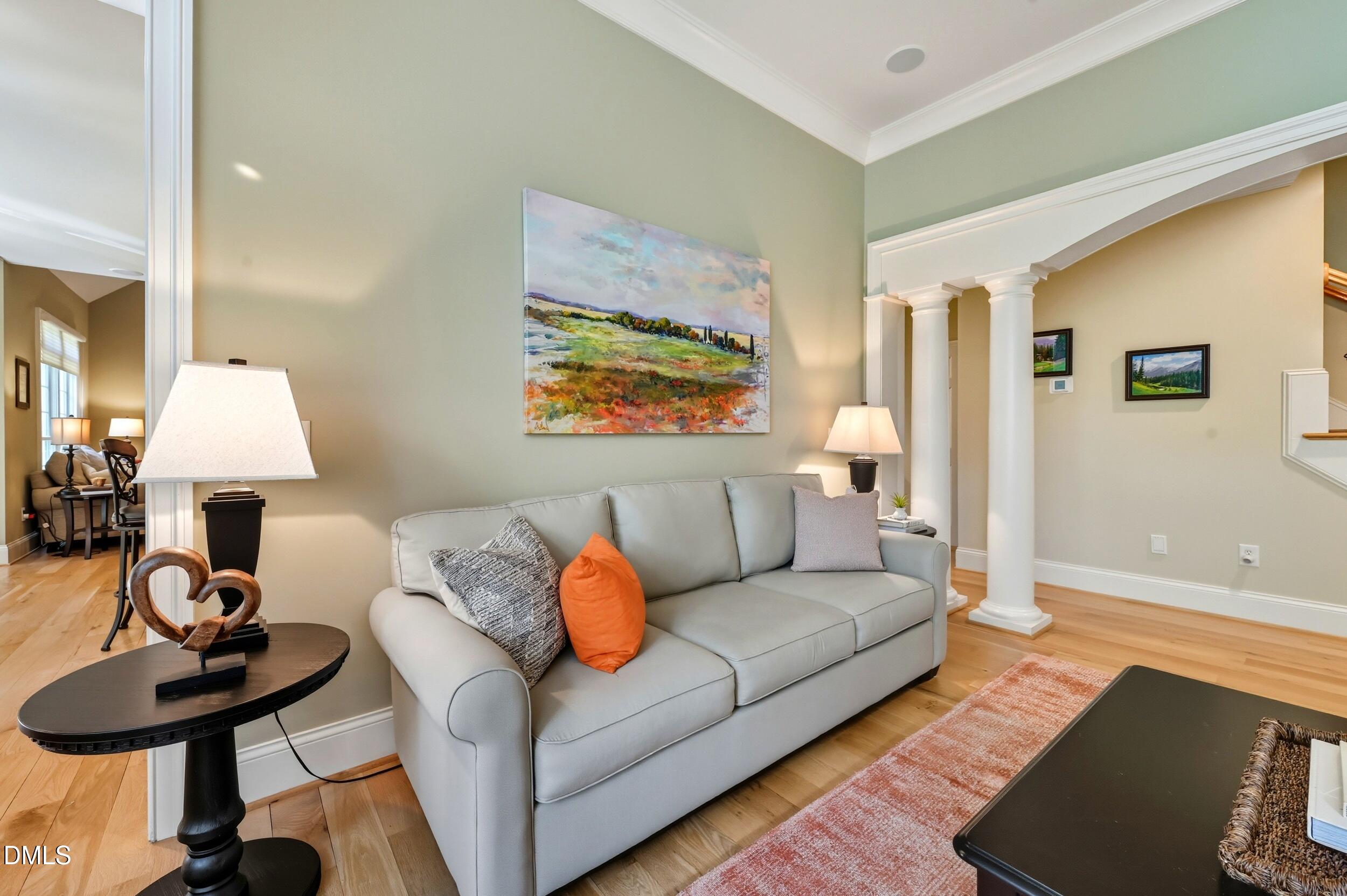 417 The Preserve Trail Chapel Hill, NC 27517 - Photo 15 of 83 a living room with furniture and a lamp