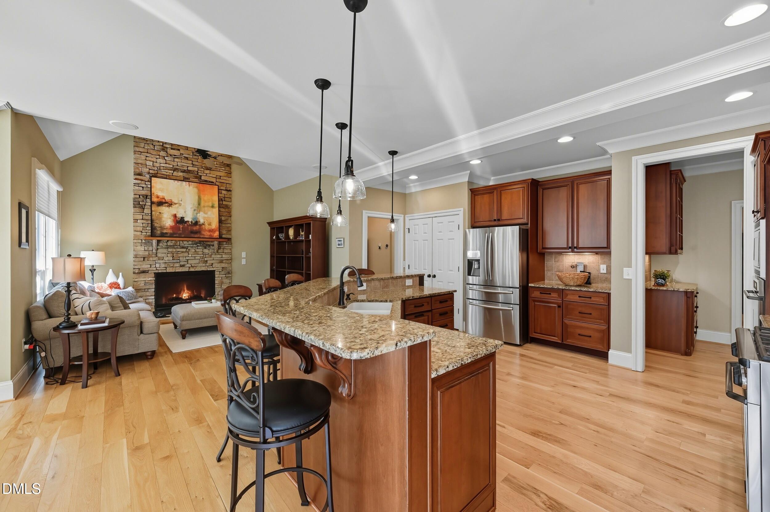 417 The Preserve Trail Chapel Hill, NC 27517 - Photo 17 of 83 a kitchen with stainless steel appliances granite countertop a refrigerator a oven a sink a stove and a wooden floors