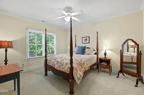 a view of a livingroom with workspace and a couch