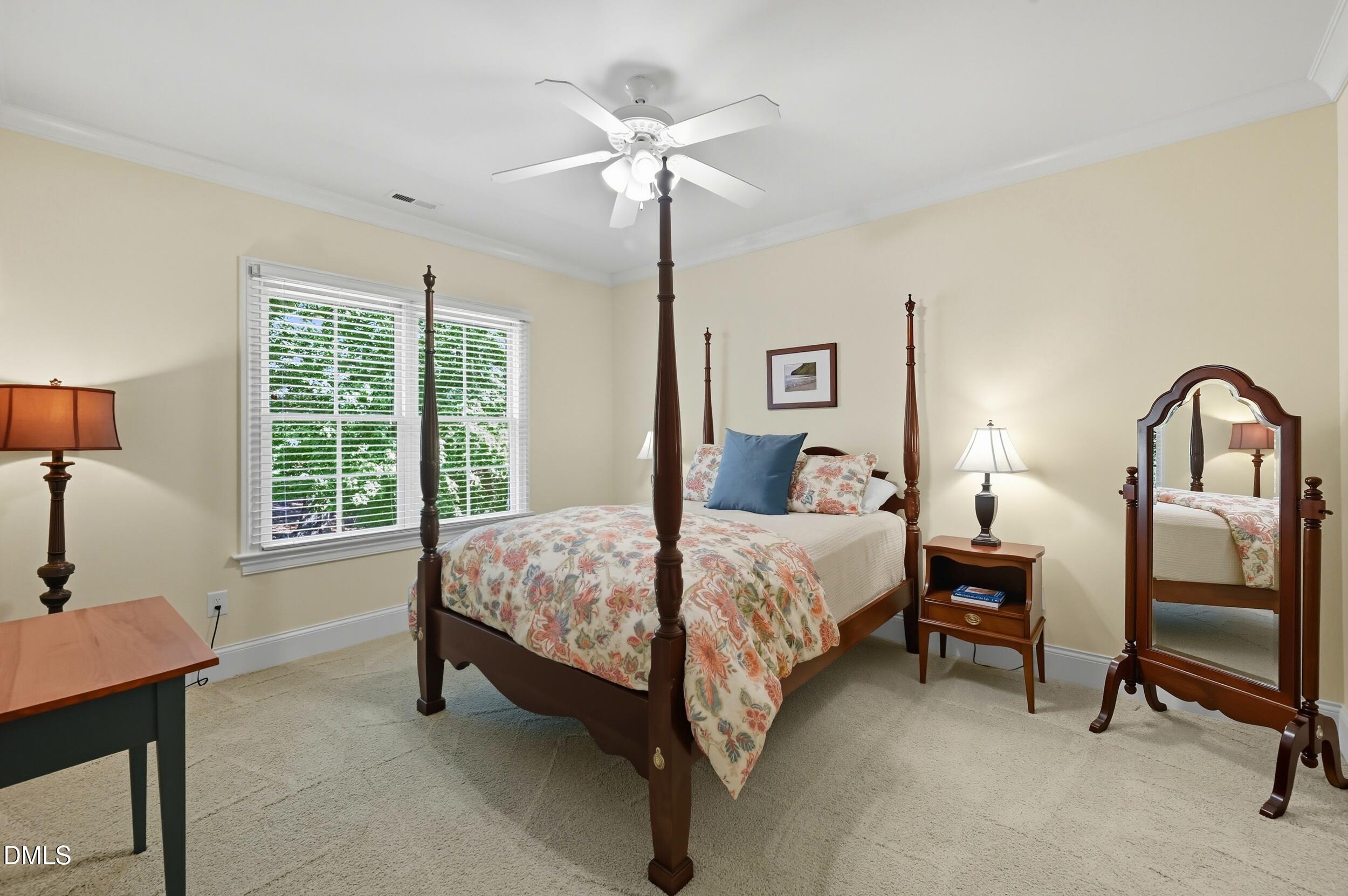417 The Preserve Trail Chapel Hill, NC 27517 - Photo 39 of 83 a bedroom with a bed desk and a window