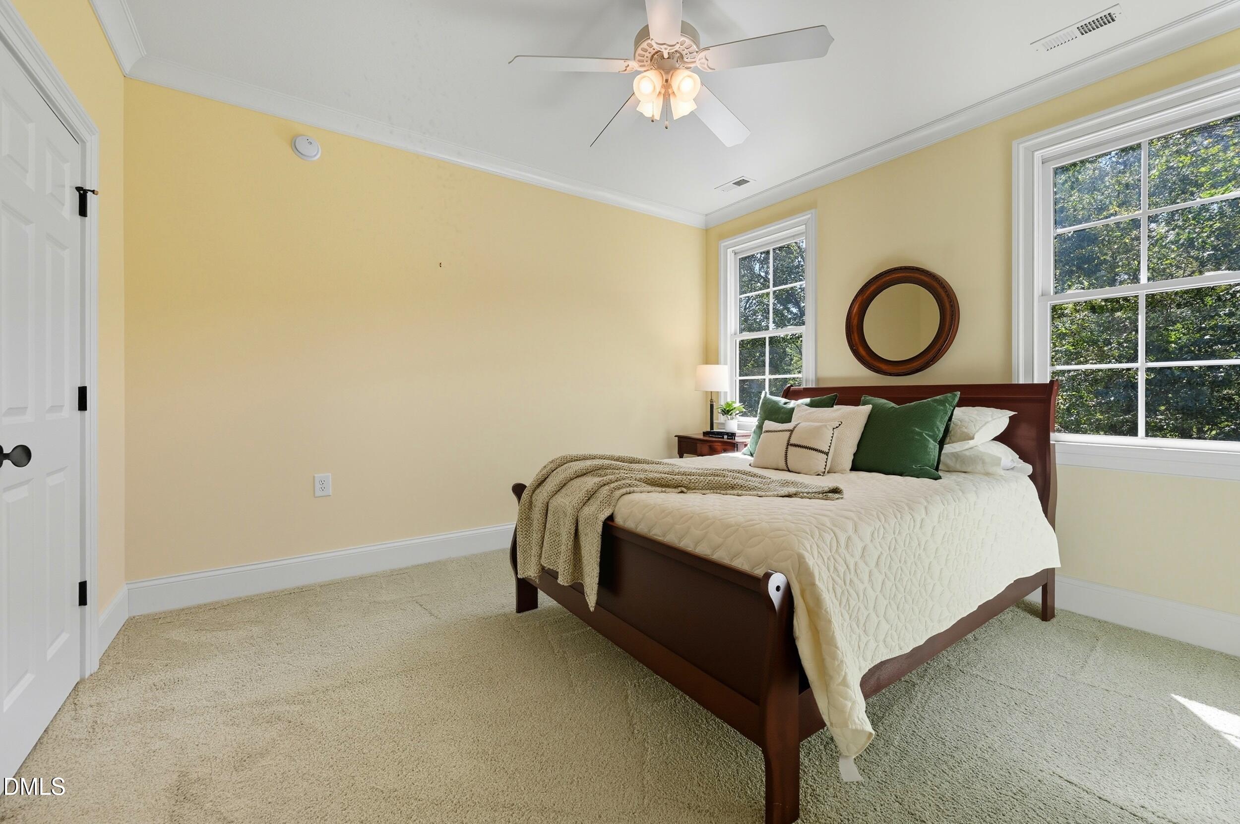 417 The Preserve Trail Chapel Hill, NC 27517 - Photo 42 of 83 a bedroom with a bed and a window