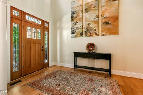 a living room with furniture fireplace and flat screen tv