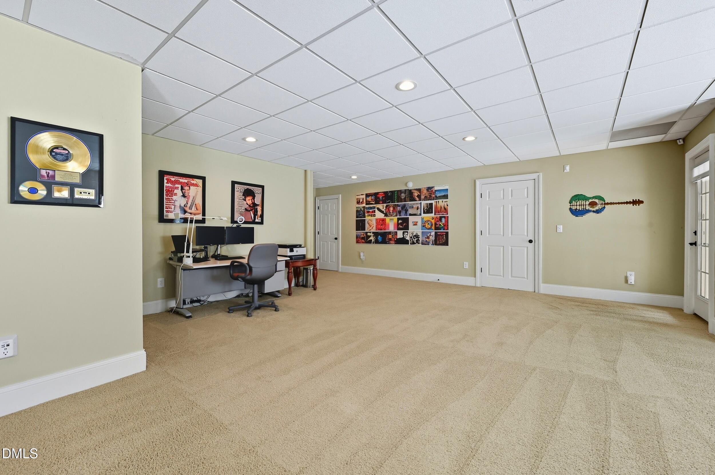 417 The Preserve Trail Chapel Hill, NC 27517 - Photo 60 of 83 a view of a livingroom with workspace and a couch