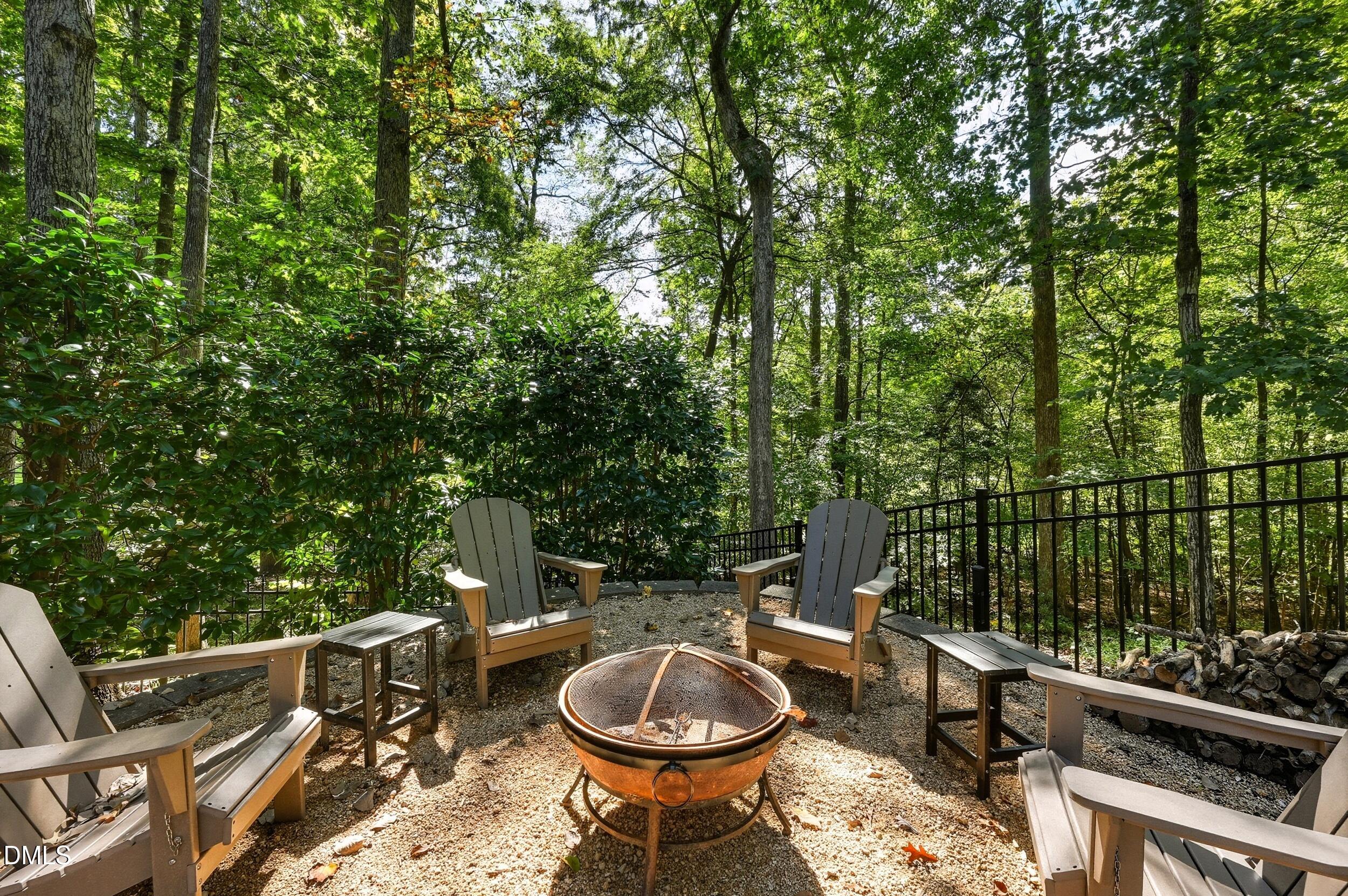 417 The Preserve Trail Chapel Hill, NC 27517 - Photo 67 of 83 a view of a backyard with furniture and a backyard