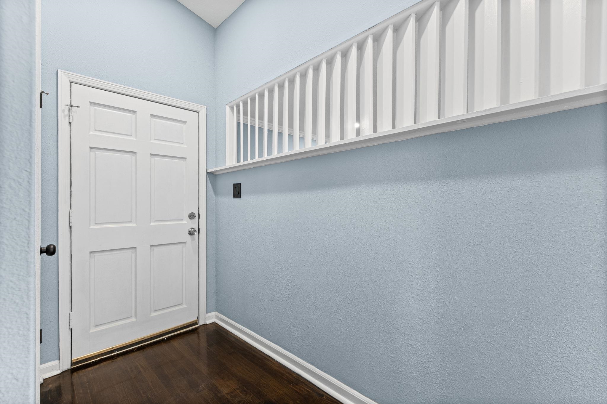 3793 Tessland Road Memphis, TN 38128 - Photo 13 of 22 Doorway to outside with baseboards and wood finished floors