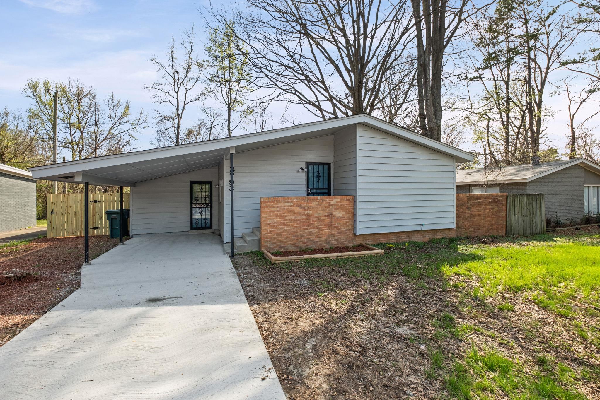 3793 Tessland Road Memphis, TN 38128 - Photo 3 of 22 View of front of home featuring an attached carport and driveway