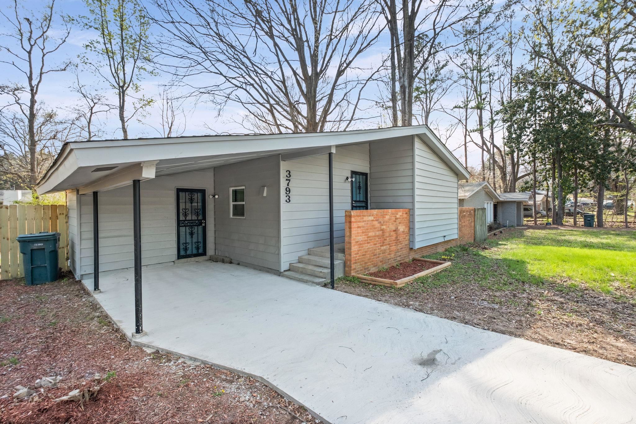 3793 Tessland Road Memphis, TN 38128 - Photo 4 of 22 View of front of house featuring an attached carport and driveway