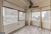 a view of an empty room and window