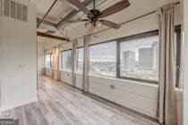 120 Ralph McGill Boulevard Northeast, Unit 1302 Atlanta, GA 30308 - Photo 16 of 28 a view of an empty room and a window