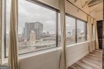 120 Ralph McGill Boulevard Northeast, Unit 1302 Atlanta, GA 30308 - Photo 18 of 28 a view of a glass door and a window