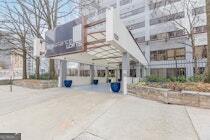 120 Ralph McGill Boulevard Northeast, Unit 1302 Atlanta, GA 30308 - Photo 2 of 28 a view of a building with a patio