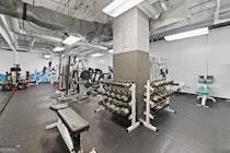 120 Ralph McGill Boulevard Northeast, Unit 1302 Atlanta, GA 30308 - Photo 25 of 28 a view of a room with gym equipment