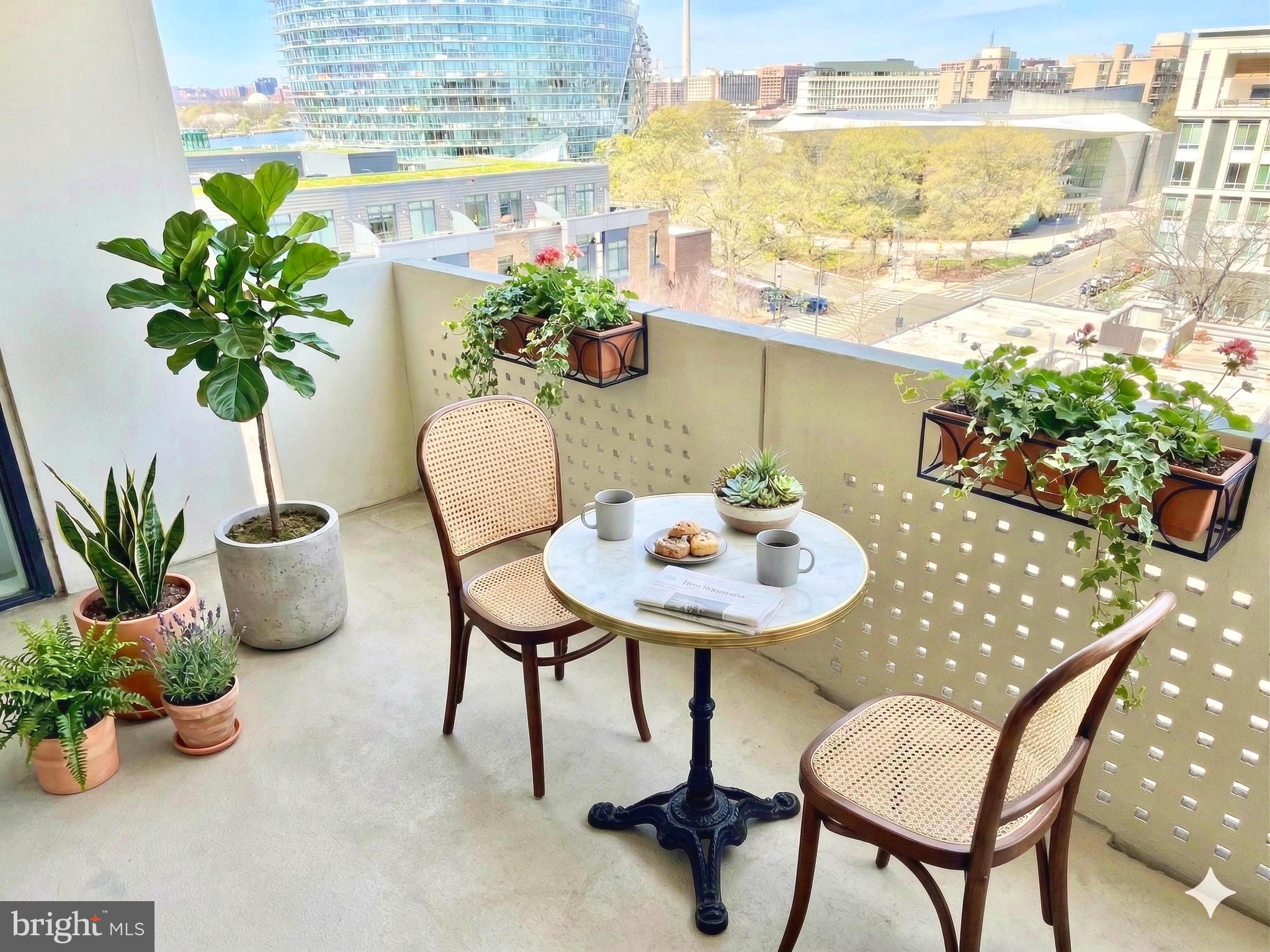 a view of a chairs and table in a patio