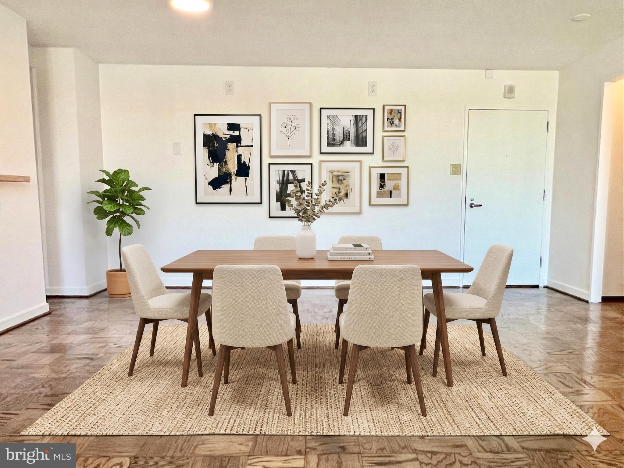 490 M Street Southwest, Unit W602 Washington, DC 20024 - Photo 4 of 24 a view of a dining room with furniture and wooden floor